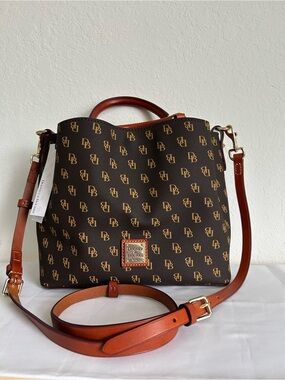 Dooney & Bourke Brown leather Logo purse with Tan Trim